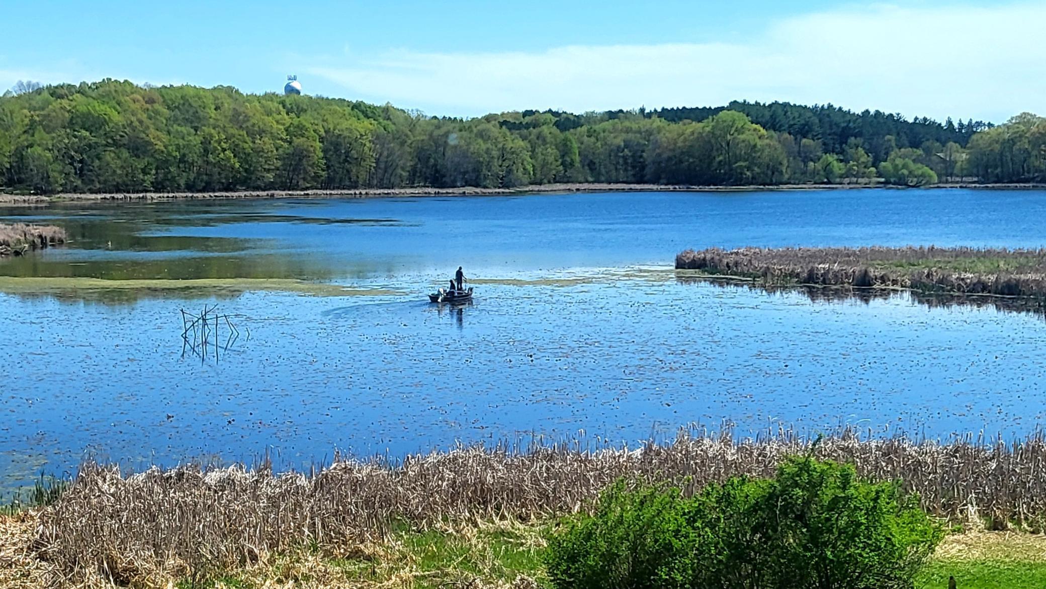 Fisherman in the bay on South Center Lake