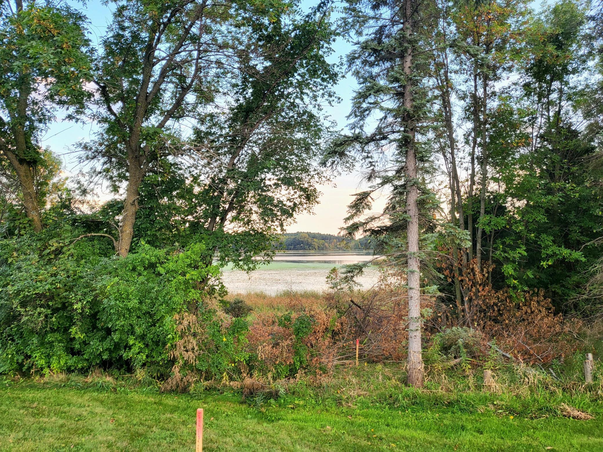 View stakes showing the garage entrance to the left with the front entrance and home on the right side..jpg