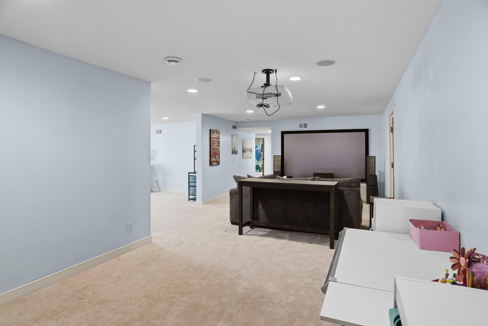 Versatile space for movie nights or gatherings.