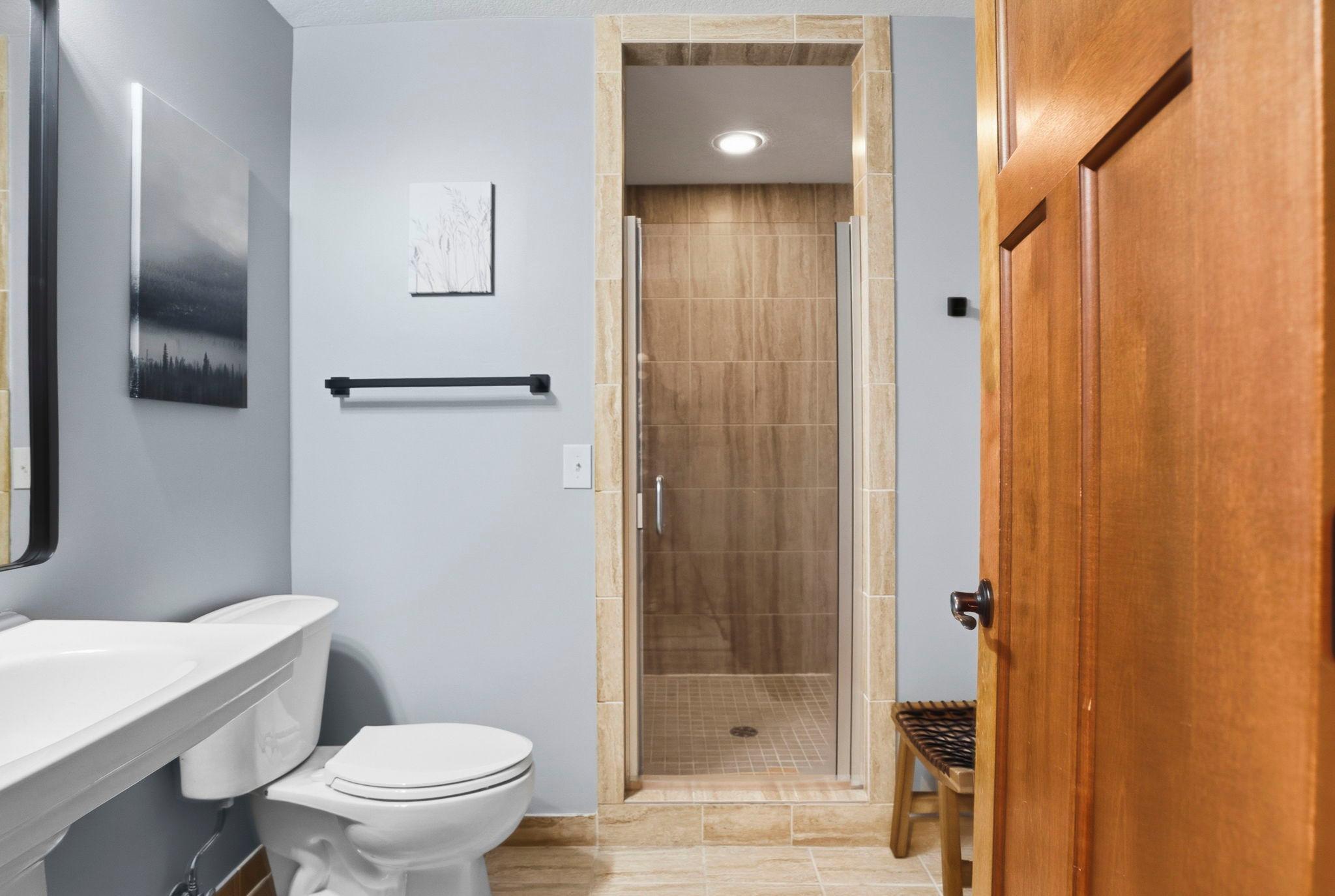 Stunning 3/4 bath with large tiled shower.