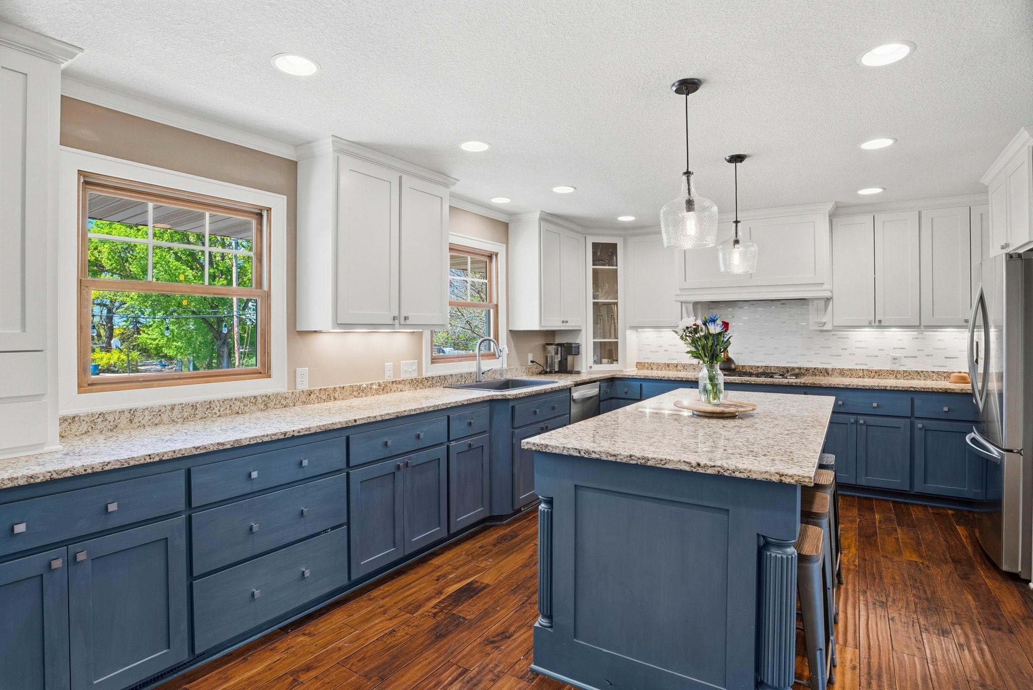 Sleek lighting and modern cabinetry complete the look.