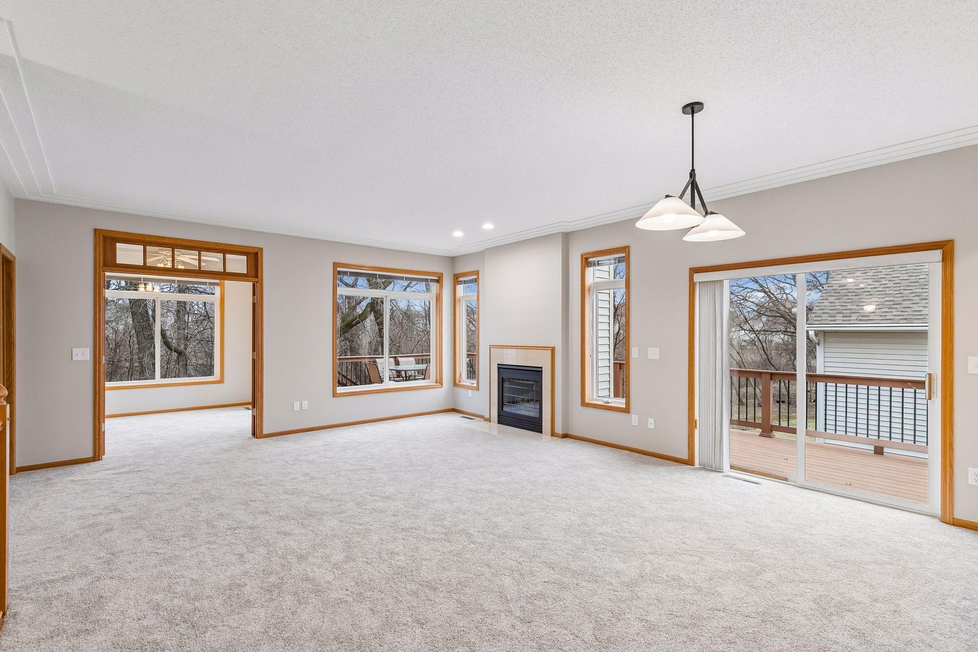 You are going to love the private views from the living room and the sunroom...woods and a pond out back. new carpeting and light fixtures. New smoke detectors and electrical outlets on the main level