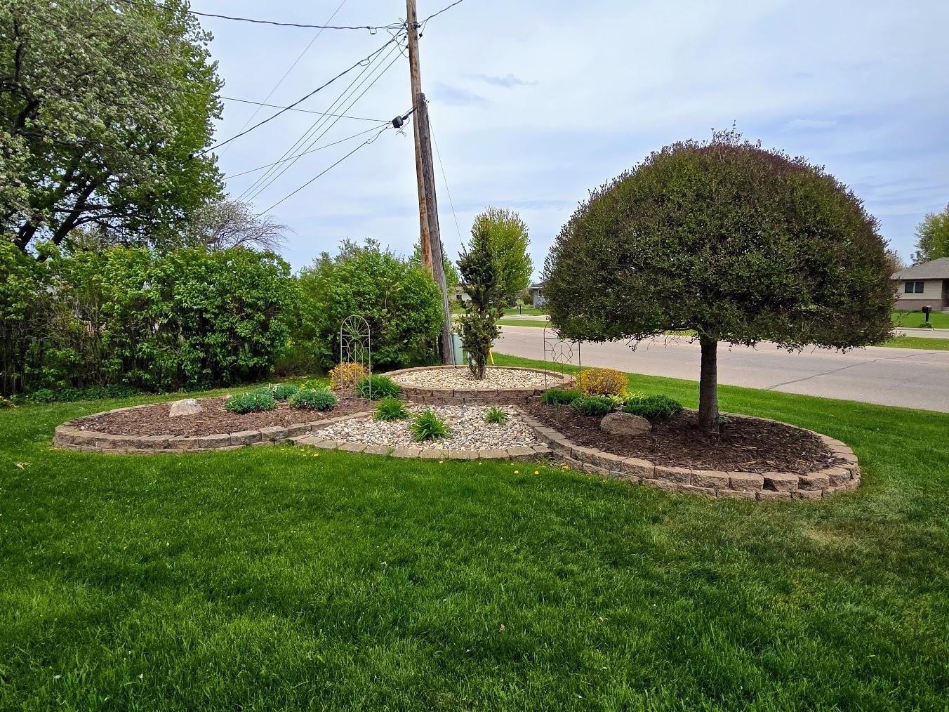 Updated landscaping in NE corner