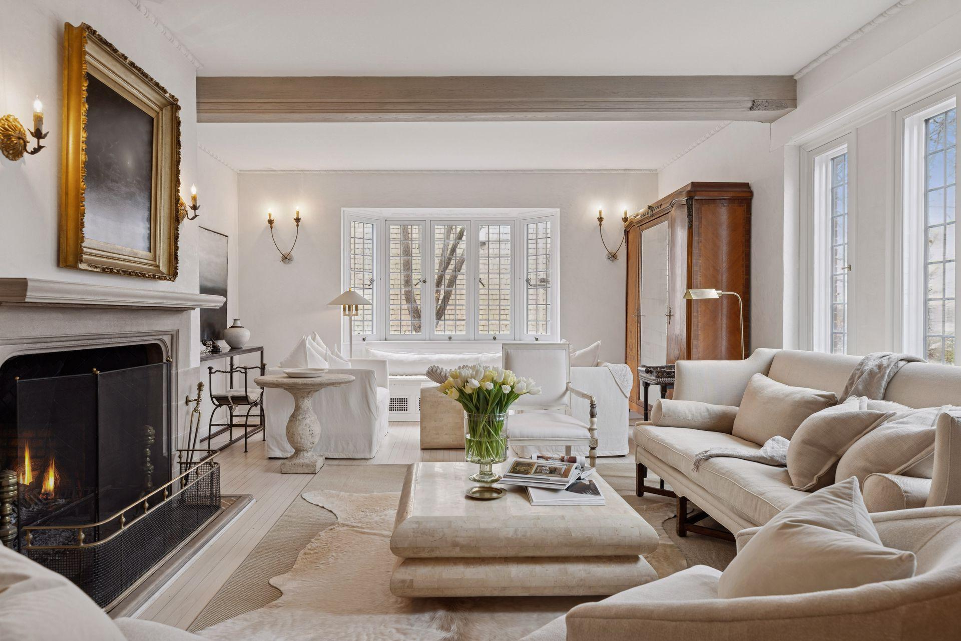 Timeless wood burning fireplace and mantle.