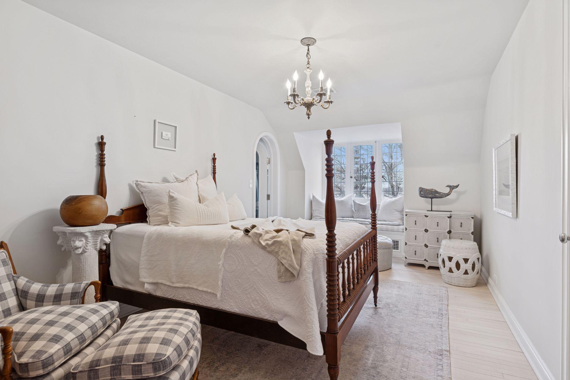 Third bedroom with en suite bath, walk-in closet, and inviting window seat.