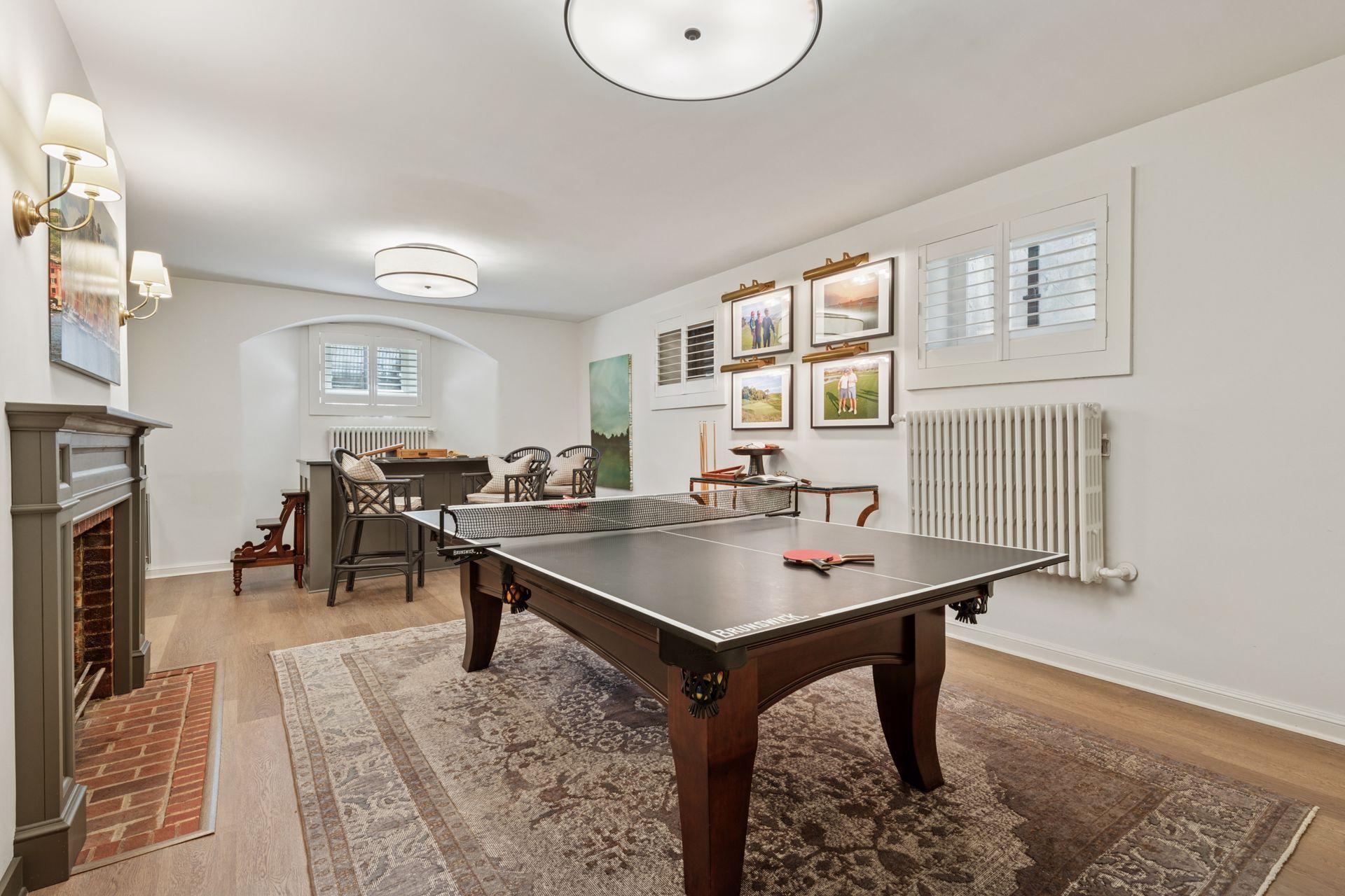 Lower level recreation room with 10' ceilings and wet bar with Scotsman ice maker.