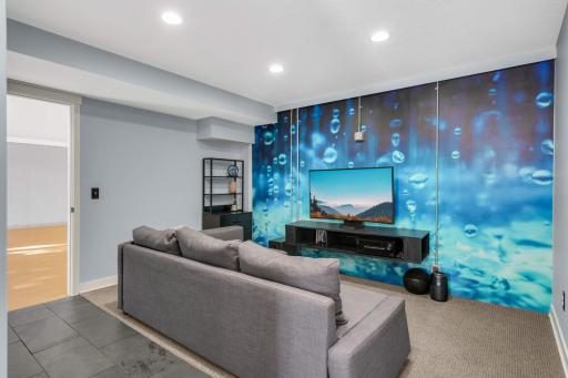 Have you ever wanted your own gaming room? Your wish is granted. This multi-use room could also be a place for Pilates, yoga, or a work-from-home space.