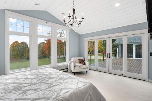 It's all the little details, like walls of glass, tongue and groove ceiling detail, and a gas fireplace that make this space so special.