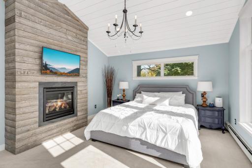 The sun-filled primary bedroom suite is gorgeous - it lives like a luxury hotel!