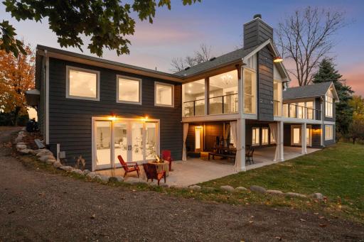 Easily access the backyard with the driveway along this side of the garage, and the sports court leads out to the amazing backyard. This home is all about the lifestyle and enjoying indoor-outdoor living.