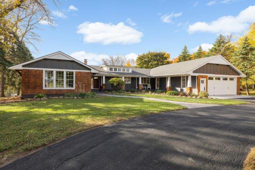 The curb appeal on this home is 10 out of 10 and is only the beginning of the wow factor in this property. It's stunning from front to back and from the curb all the way back to the shop.