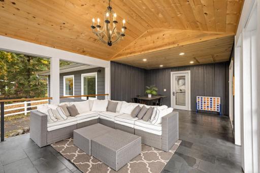During a warmer winter, the wood-burning fireplace can make this a nearly year-round space, and don't miss the pull-down easy attic access.