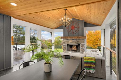 This could be the most magical room in the entire home. The screened porch features a wood-burning fireplace and access to the spacious, maintenance-free deck.