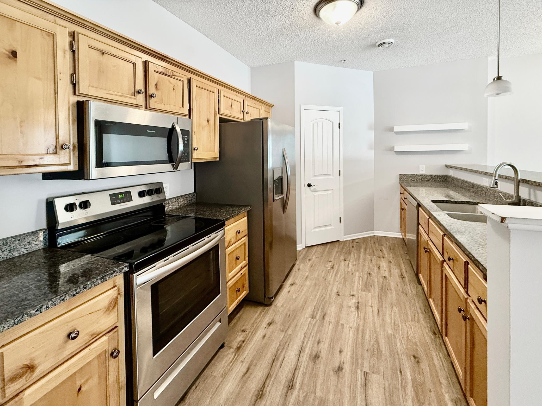 Kitchen open to living space.