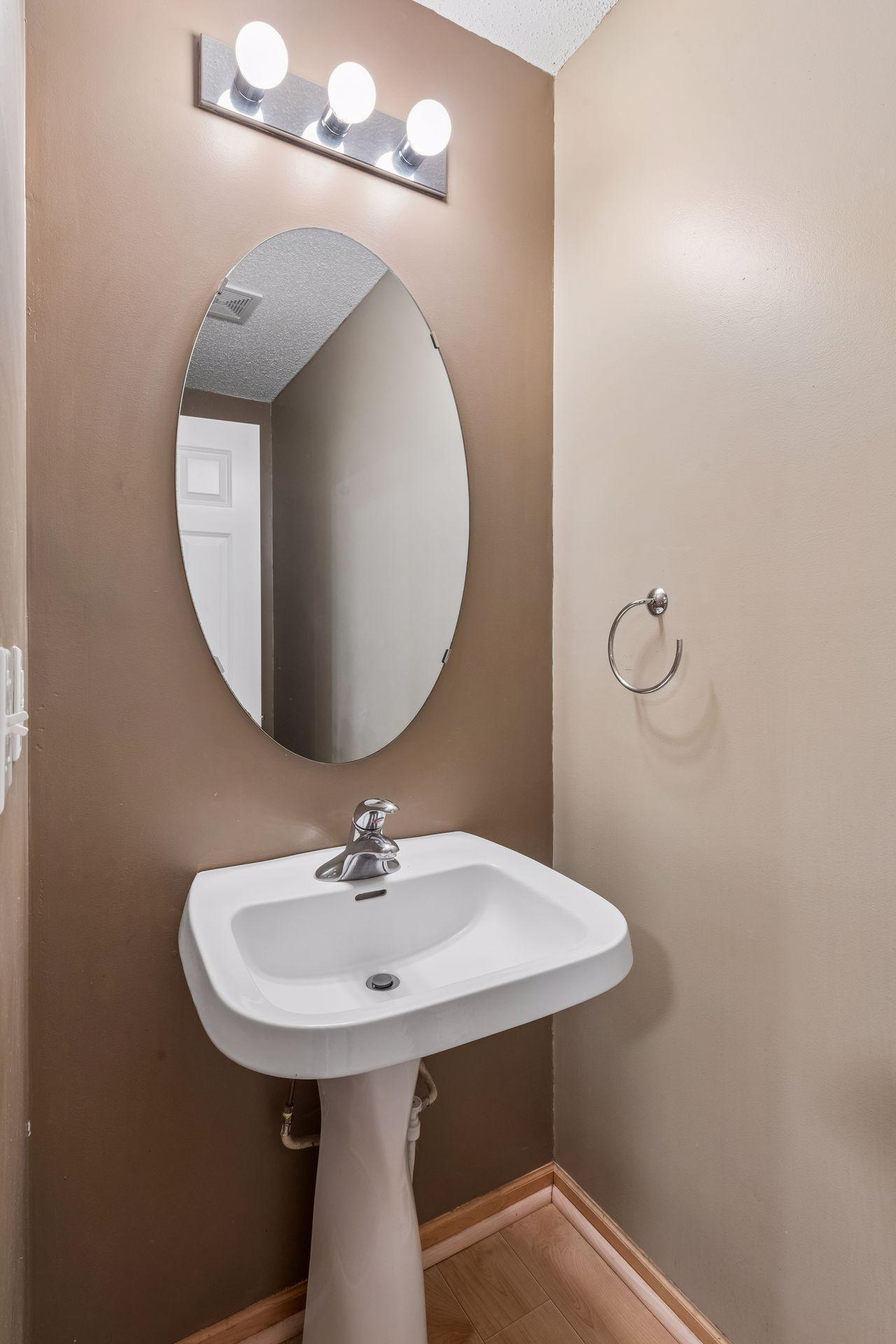 The main floor features a 1/2 bath just off the kitchen.