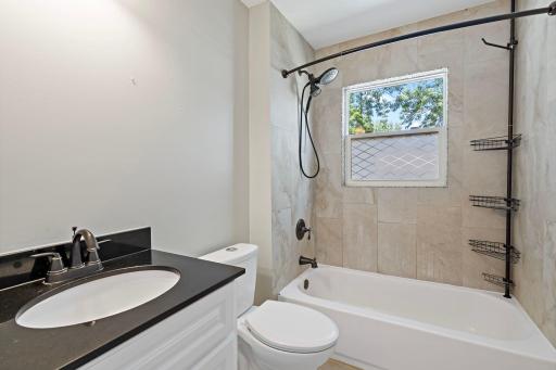 One of two beautiful full bathrooms in this home.