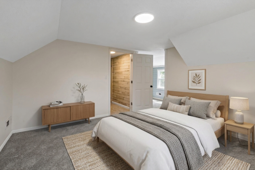 One of the upper level bedrooms virtually staged.