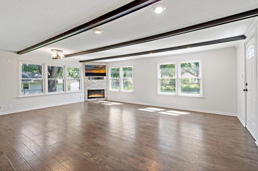 Back living room offers an amazing space and views of the backyard.
