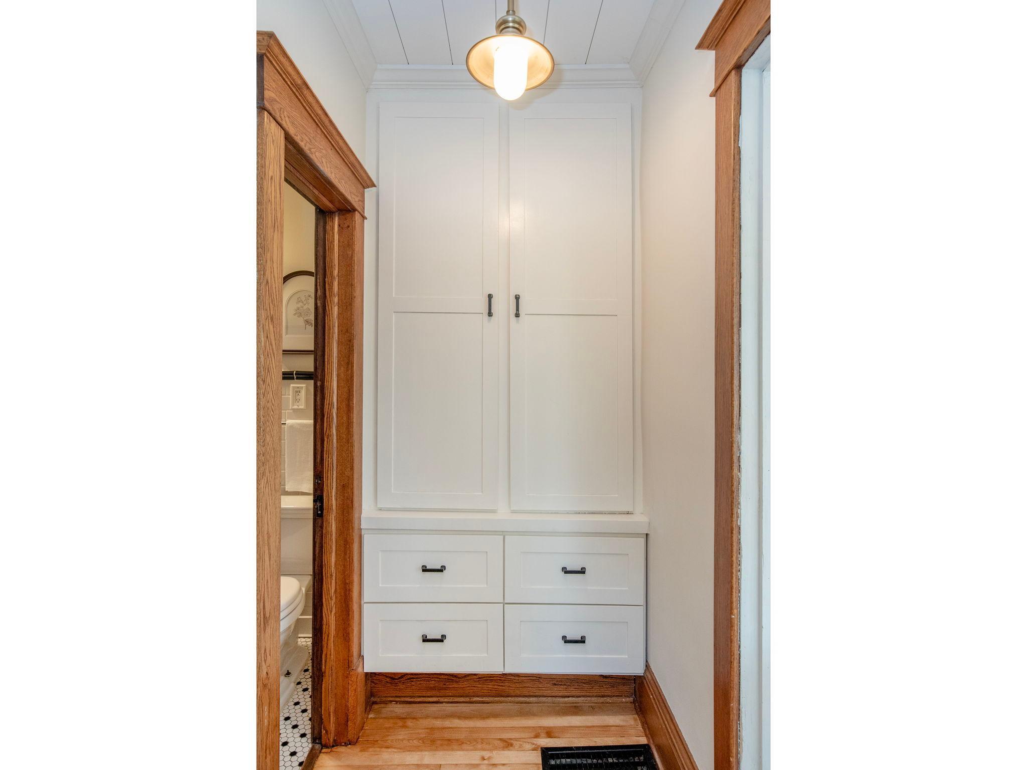 Main floor storage cabinet