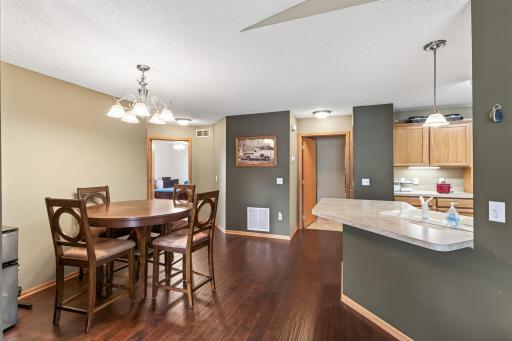 The inviting dining room offers the perfect setting for everyday meals or special gatherings, with ample space for a full-sized table and chairs.