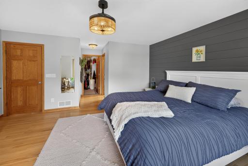 Large primary bedroom with walk in closet and bath
