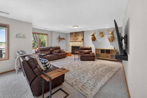 Beautiful stone fire place makes this room very comfy on cooler evenings.