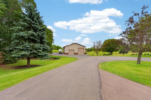 45 x 72 Pole Barn w/cement floor with (2) 14 ft overhead doors, (1) 10x12 overhead door pull through access