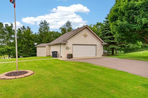 26 x 26 Detached Insulated, Heated, A/C garage with additional 30x25 additional storage behind