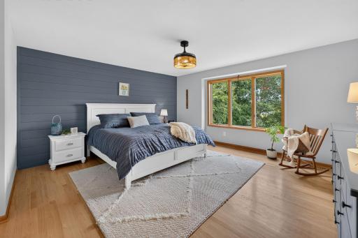Large Primary Bedroom over looking backyard to Spider Lake