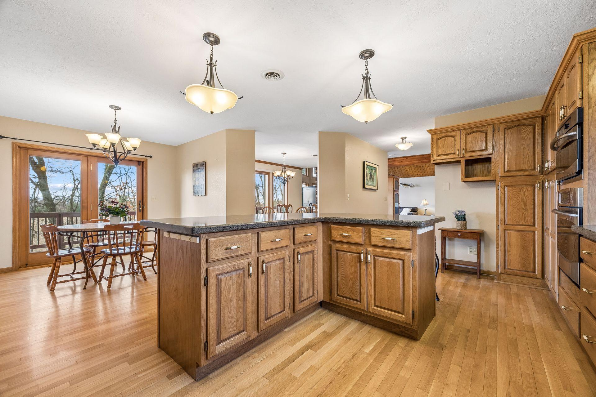 Expansive island overlooking the eat-in kitchen space.