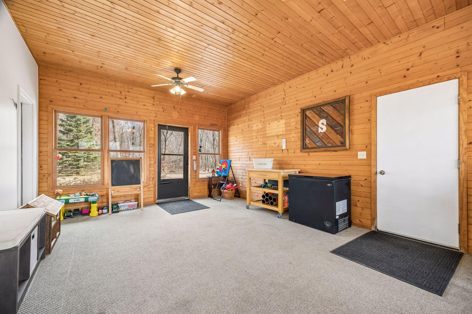 Breezeway between the home and attached garage—perfect mudroom space.