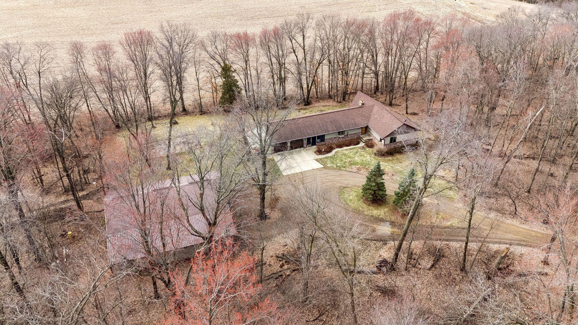 Aerial perspective highlighting the farmland behind the property.