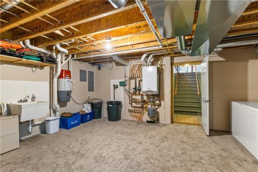 Basement and garage equipped with in-floor heat. Central Vac installed