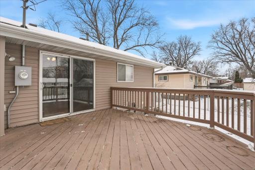 Spacious 15x15 deck with sliding door access from the home, ideal for outdoor dining, relaxing, or entertaining. New deck railings in 2021.