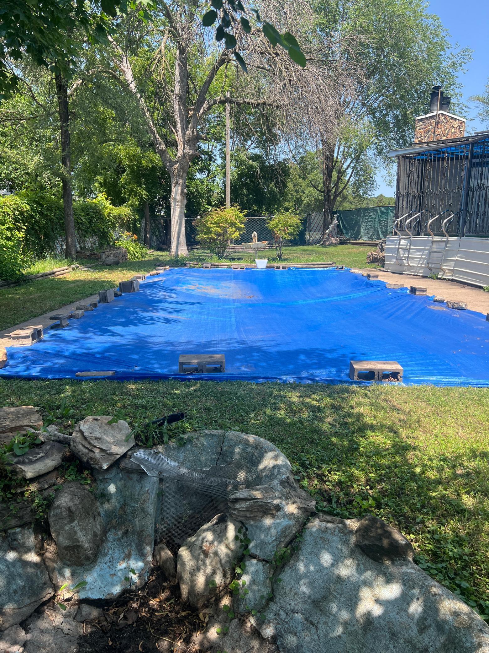 The pool needs a liner and pump at least. Please keep it covered for safety reasons. We can show it either during the inspection or on a second showing. HUGE yard!