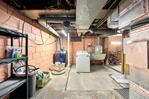 Lower level washer dryer furnace and on demand newer water heater.