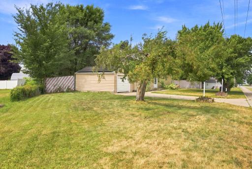 Extra parcel with room to expand for a larger garage. Concrete driveway.