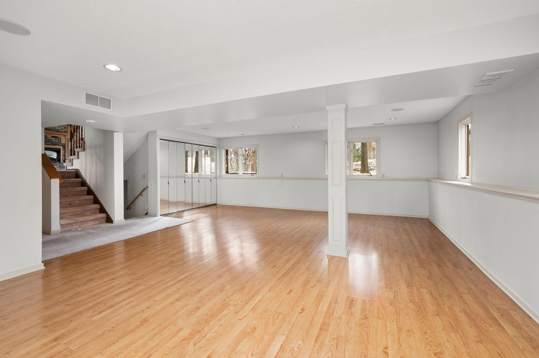 Huge Lower Level Walkout Recreation Room that could be a 4th or 5th bedroom possibility!