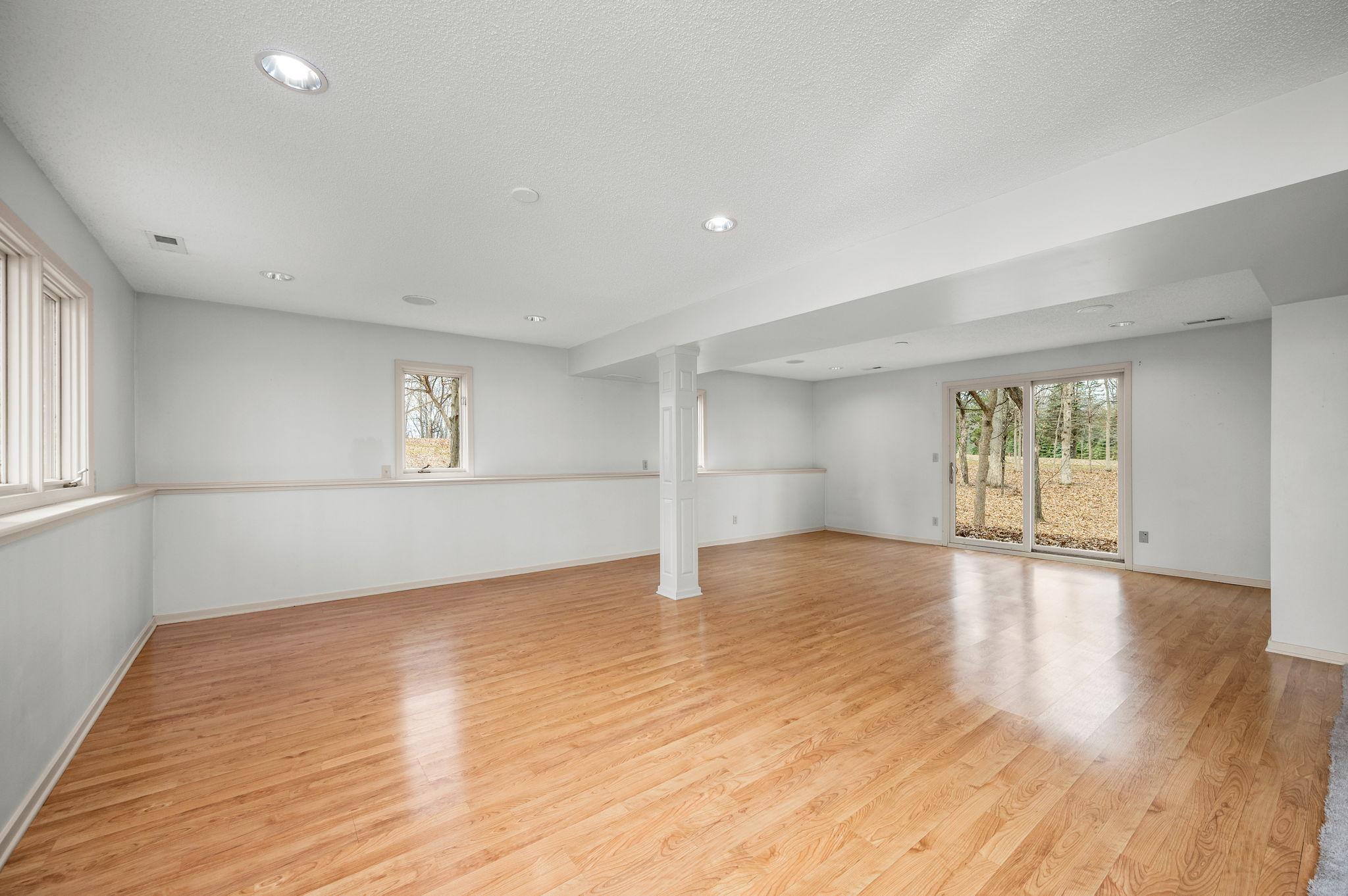 Huge Lower Level Walkout Recreation Room that could be a 4th or 5th bedroom possibility!