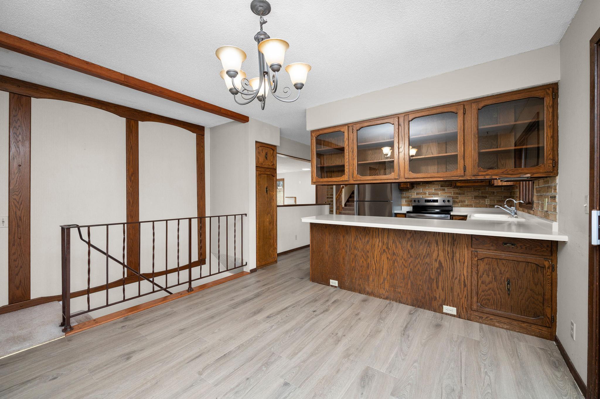 Another Informal Dining Room and Kitchen View with stairs to 3rd Level