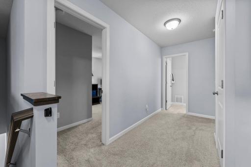 Hallway leading to 4th Bedroom and Full Bathroom