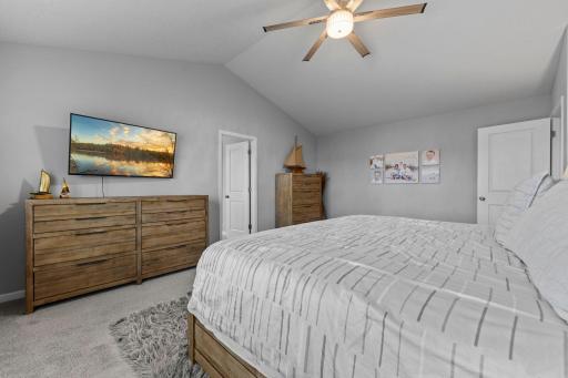 Owner's Suite with Vaulted Ceiling, Knockdown Ceiling throughout, Ceiling Fan, and Tinted Windows