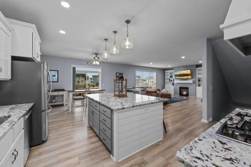 Shiplap surround on kitchen island with Quartz countertop.