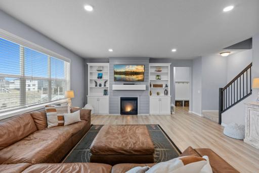 Gas fireplace with Built-ins, new flooring, tinted windows, recessed lighting, and more!