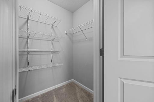 Walk-in Closet in Upper-level Bedroom