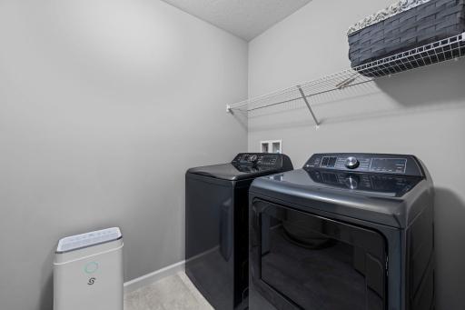 Upper level laundry room.