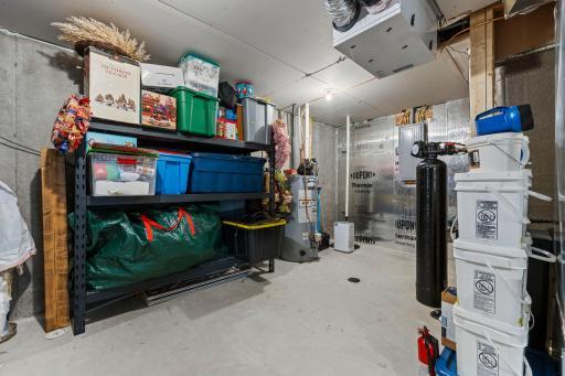 Mechanical Room is large with storage space