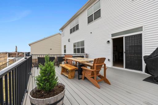 View of the house with the deck- you can see the tinted windows! Look at that privacy and energy savings!