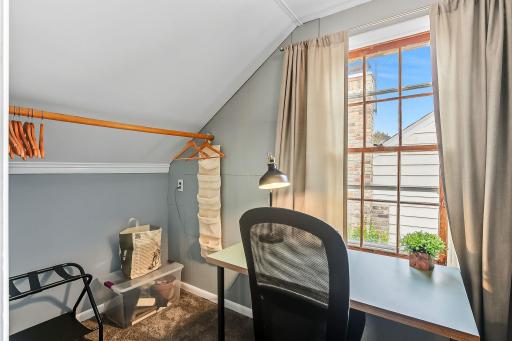 Walk-in closet in the third floor is currently being used as an office.