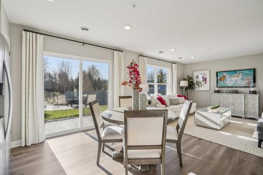 Open floor plan with loads of natural light. Model photos. Options and colors will vary.